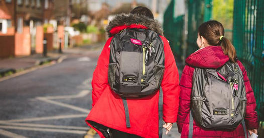 Children walking outside school.