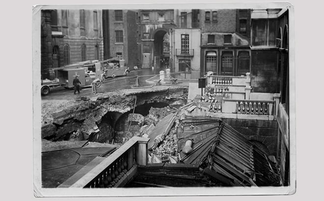 Bomb damage caused when an unexploded bomb landed in the King’s College London Quadranglein 1940.