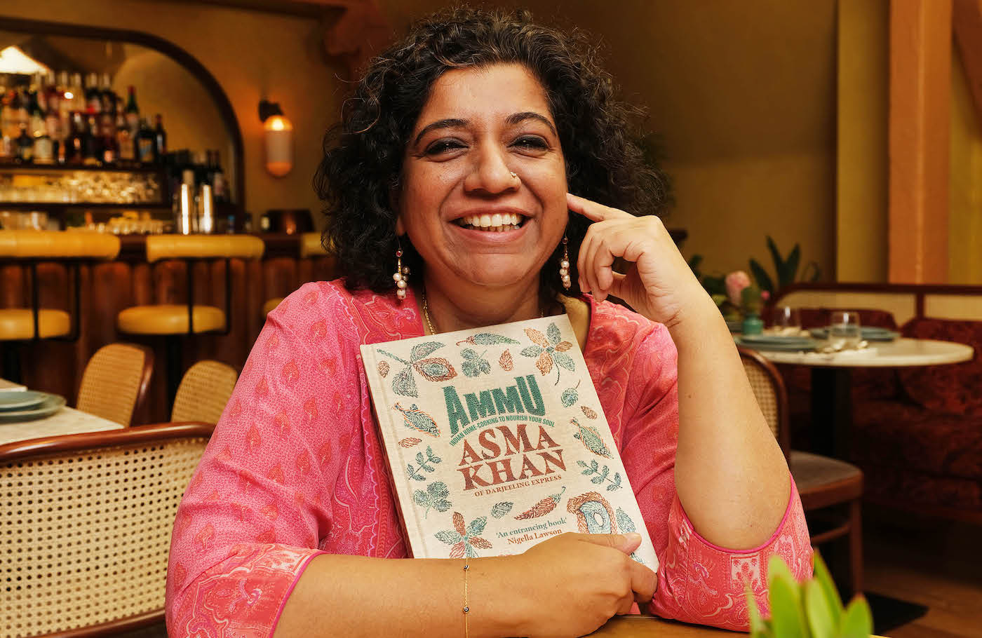 Asma with her book AMMU.